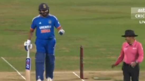 Rohit Sharma chats with umpire Virender Sharma (X)