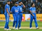 India's captain Rohit Sharma (2L) along with his teammates gestures during the third and final Twenty20I vs Afghanistan