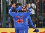 India's captain Rohit Sharma congratulates Virat Kohli after the latter took the catch to get Afghanistan's Najibullah Zadran out 