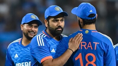 India's captain Rohit Sharma (C) celebrates with Virat Kohli (R) and Kuldeep Yadav after winning the second super over (AFP) India's captain Rohit Sharma (C) celebrates with Virat Kohli (R) and Kuldeep Yadav after winning the second super over (AFP)