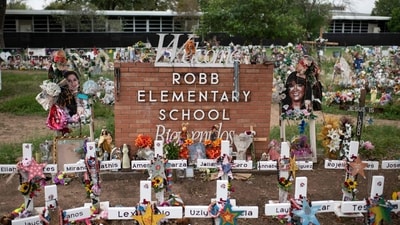 A damning Justice Department report on January 18, 2023, cited "critical failures" by Texas police who waited until 21 people had been killed by a mass shooter at a school before finally intervening. Nineteen young children and two teachers were killed when a teenage gunman went on a rampage at Robb Elementary School in May 2022 in America's worst school shooting in a decade. Police eventually shot and killed the gunman. (Photo by Mark Felix / AFP) (AFP) A damning Justice Department report on January 18, 2023, cited "critical failures" by Texas police who waited until 21 people had been killed by a mass shooter at a school before finally intervening. Nineteen young children and two teachers were killed when a teenage gunman went on a rampage at Robb Elementary School in May 2022 in America's worst school shooting in a decade. Police eventually shot and killed the gunman. (Photo by Mark Felix / AFP) (AFP)