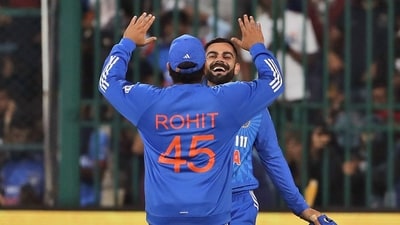 India's captain Rohit Sharma congratulates Virat Kohli after the latter took the catch to get Afghanistan's Najibullah Zadran out (AP) India's captain Rohit Sharma congratulates Virat Kohli after the latter took the catch to get Afghanistan's Najibullah Zadran out (AP)