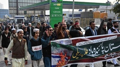 Youth activists of Muslim Talba Mahaz (MTM) holding a banner shout slogans during a protest against Iranian air strike in Islamabad on January 18. (AFP) Youth activists of Muslim Talba Mahaz (MTM) holding a banner shout slogans during a protest against Iranian air strike in Islamabad on January 18. (AFP)