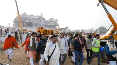 Ramlalla's representative idol being carried across the Ram Temple premises in Ayodhya on Wednesday. (ANI)
