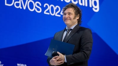 Argentina's President Javier Milei arrives to deliver a speech at the World Economic Forum (WEF) meeting in Davos on January 17, 2024. (AFP) Argentina's President Javier Milei arrives to deliver a speech at the World Economic Forum (WEF) meeting in Davos on January 17, 2024. (AFP)