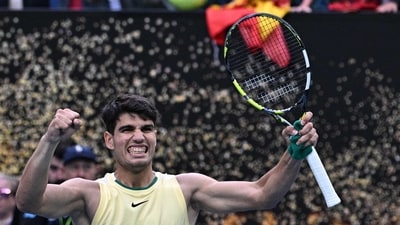 Spain's Carlos Alcaraz celebrates after victory against Italy's Lorenzo Sonego during their men's singles match (AFP) Spain's Carlos Alcaraz celebrates after victory against Italy's Lorenzo Sonego during their men's singles match (AFP)