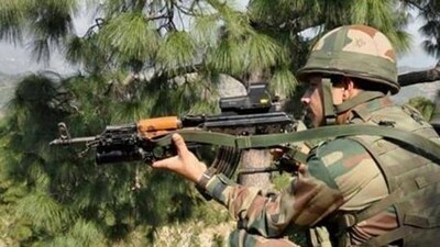 An Indian army soldier takes position near the Line of Control in Naushera sector of Rajouri near Jammu. (File photo) An Indian army soldier takes position near the Line of Control in Naushera sector of Rajouri near Jammu. (File photo)