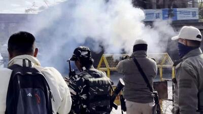 mphal: Police personnel fire tear gas at women who came to meet Manipur chief minister N Biren Singh, in Imphal, Thursday. (PTI) mphal: Police personnel fire tear gas at women who came to meet Manipur chief minister N Biren Singh, in Imphal, Thursday. (PTI)