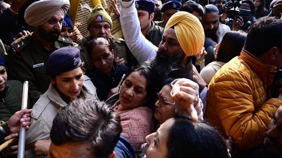 AAP, Congress councillors protest outside municipal corporation office. AAP, Congress councillors protest outside municipal corporation office.