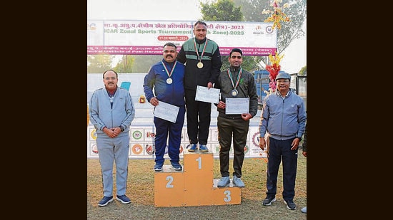 Winners displaying their medals during the second day of ICAR Zonal Sports Tournament (North Zone) held in Ludhiana. (HT)
