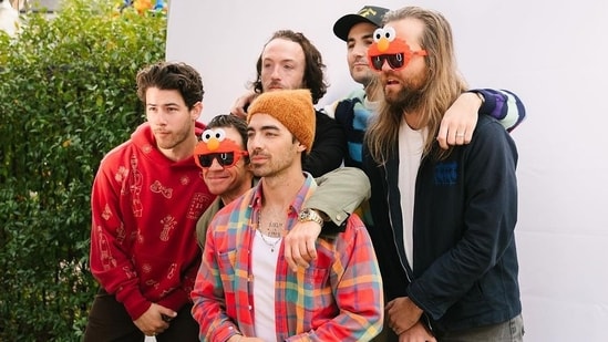 In another pic, Nick Jonas was seen posing with his brother Joe Jonas and a few friends, who donned Elmo-themed sunglasses. Even his brother Franklin Jonas got in on the fun by posing with the Sesame Street character at Malti Marie Chopra Jonas' birthday bash.&nbsp;