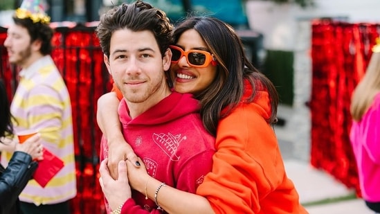 Nick Jonas also posted a snap of himself and Priyanka Chopra sharing a sweet embrace at the birthday bash, dubbed 'Malti’s World. &nbsp;The proud parents also wore colourful outfits: &nbsp;Priyanka had a bright orange hoodie and matching shades on, while her singer-husband, whom she wed in 2018, opted for a red hoodie and brown jeans.