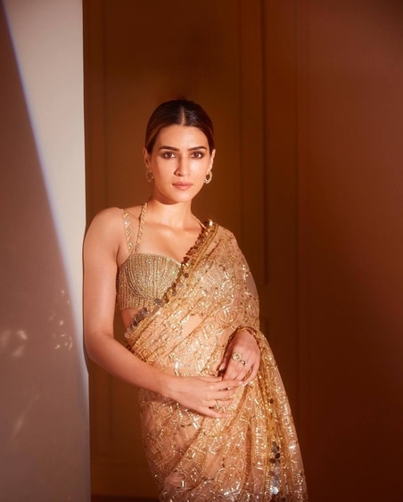 Kriti Sanon in a beautiful gold drape (Instagram) Kriti Sanon in a beautiful gold drape (Instagram)