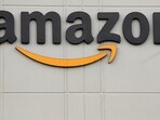 The Amazon logo pictured outside the company's JFK8 distribution center New York. The Amazon logo pictured outside the company's JFK8 distribution center New York.