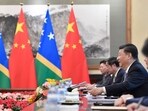 FILE - Chinese President Xi Jinping talks to Prime Minister of the Solomon Islands Manasseh Sogavare, not pictured, during their meeting at the Diaoyutai State Guesthouse in Beijing, Wednesday, Oct. 9, 2019. Beijing is increasingly targeting its South Pacific political allies with its shrinking aid budget as competition intensifies with the United States for influence in the region, Sydney’s Lowy Institute has reported in its latest annual analysis of regional assistance.(Parker Song/Pool Photo via AP, File)