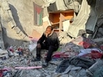 A man looks on at the site of an Israeli strike on a house, amid the ongoing conflict between Israel and the Palestinians in South Gaza's Rafah on January 18.