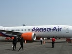 Visitors gathered near an Akasa Air aircraft during the 'Wings India 2024', an exhibition and conference on civil aviation, at the Begumpet Airport in Hyderabad on January 18, 2024. Visitors gathered near an Akasa Air aircraft during the 'Wings India 2024', an exhibition and conference on civil aviation, at the Begumpet Airport in Hyderabad on January 18, 2024.