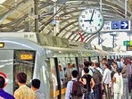 Passengers board a train at a metro station in Delhi. (HT Photo) Passengers board a train at a metro station in Delhi. (HT Photo)