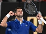 Serbia's Novak Djokovic celebrates after victory against Argentina's Tomas Etcheverry during their men's singles match in Australian Open Serbia's Novak Djokovic celebrates after victory against Argentina's Tomas Etcheverry during their men's singles match in Australian Open