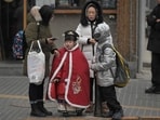 TOPSHOT - People are seen on a street in Beijing on January 17, 2024. China's population decline accelerated in 2023, official data showed on january 17, 2024, extending a downward streak after more than six decades of growth as the country battles a looming demographic crisis. (Photo by Pedro PARDO / AFP)