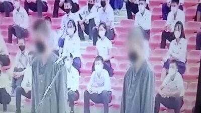 Video footage showed North Korean authorities publicly sentencing two teenagers. Video footage showed North Korean authorities publicly sentencing two teenagers.