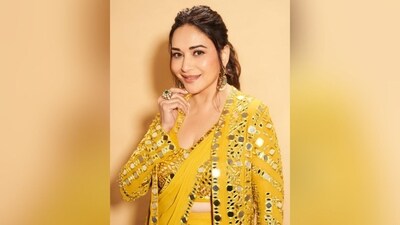 With the help of makeup artist Billy Manik, Madhuri got decked up in nude eyeshadow, mascara-coated lashes, winged eyeliner, darkened brows, blushed cheeks, glowing highlighter and a shade of nude lipstick. (Instagram/@madhuridixitnene) With the help of makeup artist Billy Manik, Madhuri got decked up in nude eyeshadow, mascara-coated lashes, winged eyeliner, darkened brows, blushed cheeks, glowing highlighter and a shade of nude lipstick. (Instagram/@madhuridixitnene)