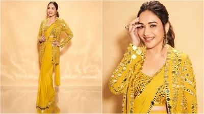 Madhuri Dixit is the epitome of style and grace, who continues to conquer fashion goals like a pro. She is one of those actresses who is ageing like a fine wine and getting more gorgeous by the day. The OG diva is the queen of saree looks and continues to serve ethnic fashion goals for all her fans. She may not be doing many films right now, but she makes sure to stay in the limelight with her head-turning looks and undeniable beauty. As the wedding season is here and so are the cold winters, Madhuri is here to show you how to slay the saree look in this winter by pairing it with a chic jacket. Scroll down to take notes. (Instagram/@madhuridixitnene) Madhuri Dixit is the epitome of style and grace, who continues to conquer fashion goals like a pro. She is one of those actresses who is ageing like a fine wine and getting more gorgeous by the day. The OG diva is the queen of saree looks and continues to serve ethnic fashion goals for all her fans. She may not be doing many films right now, but she makes sure to stay in the limelight with her head-turning looks and undeniable beauty. As the wedding season is here and so are the cold winters, Madhuri is here to show you how to slay the saree look in this winter by pairing it with a chic jacket. Scroll down to take notes. (Instagram/@madhuridixitnene)