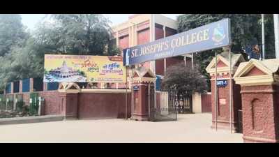 A hoarding of the temple consecration outside St Joseph’s College in Prayagraj (HT Photo) A hoarding of the temple consecration outside St Joseph’s College in Prayagraj (HT Photo)