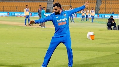 The ever-so-entertaining Virat Kohli 'slides in' during India's trophy celebration (ANI ) The ever-so-entertaining Virat Kohli 'slides in' during India's trophy celebration (ANI )