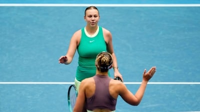 Amanda Anisimova, top, of the U.S. is congratulated by Paula Badosa of Spain following their third round match at the Australian Open tennis championships at Melbourne Park, Melbourne, Australia (AP) Amanda Anisimova, top, of the U.S. is congratulated by Paula Badosa of Spain following their third round match at the Australian Open tennis championships at Melbourne Park, Melbourne, Australia (AP)