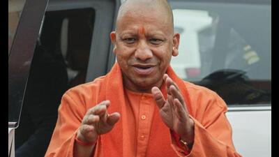 Chief minister Yogi Adityanath arrives at Shri Ram Janmabhoomi Temple, ahead of its consecration ceremony, in Ayodhya, Friday. (PTI Photo) Chief minister Yogi Adityanath arrives at Shri Ram Janmabhoomi Temple, ahead of its consecration ceremony, in Ayodhya, Friday. (PTI Photo)