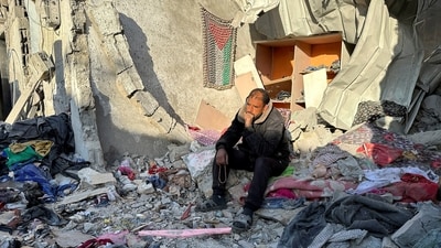 A man looks on at the site of an Israeli strike on a house, amid the ongoing conflict between Israel and the Palestinians in South Gaza's Rafah on January 18. (Reuters)