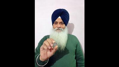 Narinder Pal Singh, a Sikh man from Ludhiana, has attracted attention for his unique collection of 59 handwritten Hindu scriptures, including 238-year-old Ramcharitmanas. (HT Photo) Narinder Pal Singh, a Sikh man from Ludhiana, has attracted attention for his unique collection of 59 handwritten Hindu scriptures, including 238-year-old Ramcharitmanas. (HT Photo)