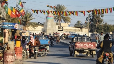 Commuters ride along a street at Panjgur district in Balochistan province after an Iranian air strike killed two children in the west of the country (AFP) Commuters ride along a street at Panjgur district in Balochistan province after an Iranian air strike killed two children in the west of the country (AFP)