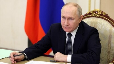 Russian president Vladimir Putin chairs a meeting. (AFP) Russian president Vladimir Putin chairs a meeting. (AFP)
