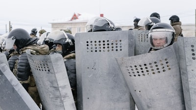 Russia Fail Alsynov Protests: Riot policemen are seen deployed to disperse protesters in the town of Baymak in Russia's central Bashkortostan region. (AFP) Russia Fail Alsynov Protests: Riot policemen are seen deployed to disperse protesters in the town of Baymak in Russia's central Bashkortostan region. (AFP)