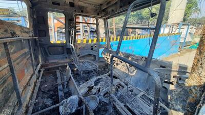 Thane, India - January ,19, 2024: a container going from Thane to Gujarat overturned near Ghodbunder Road near Patalipada Bridge and caught fire. And one person in the container was burnt to death in this fire ,in Thane, in Mumbai, India, on, Friday, January ,19, 2024. ( Praful Gangurde / HT Photo )