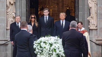 Viktor Knavs, Melania Trump, Barron Trump, former U.S. President Donald Trump and Rev. Tim Schenck watch as the the casket of Melania's mother Amalija Knavs is brought into the church for her funeral at The Church of Bethesda-by-the-Sea in Palm Beach, Florida, U.S. January 18, 2024. (via REUTER)