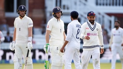 India's Virat Kohli and Ravindra Jadeja as England's Jos Buttler and Ollie Robinson look on. (Action Images via Reuters)