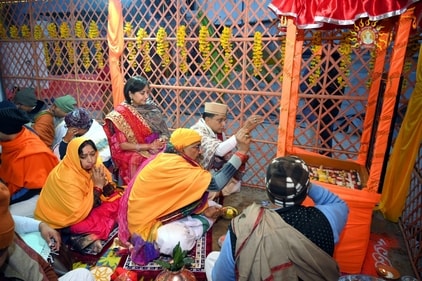 Devotees at 'Havan Kunds' prepared for the consecration ceremony of Ram Temple, in Ayodhya on January 18. (PTI) Devotees at 'Havan Kunds' prepared for the consecration ceremony of Ram Temple, in Ayodhya on January 18. (PTI)