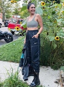 Mrunal Thakur in a checkered crop top and contrast stitching denim joggers (Photo: Instagram)