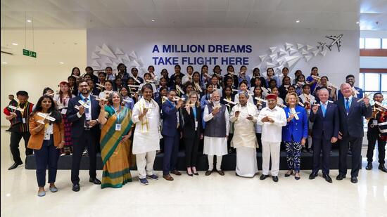 Prime Minister Narendra Modi with Karnataka governor Thaawarchand Gehlot, chief minister Siddaramaiah and others during the inauguration of the new state-of-the-art Boeing India Engineering and Technology Center campus in Bengaluru on Friday. (ANI)