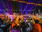 Ayodhya, Jan 19 (ANI): Devotees gather to watch the laser show at 'Ram ki Pedi' ahead of the 'Pran Pratishtha' ceremony in Ayodhya on Friday. (ANI Photo/Amit Sharma)