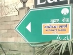 Hindu Sena activists pasted stickers of Ayodhya Marg on Babar Road signboards Hindu Sena activists pasted stickers of Ayodhya Marg on Babar Road signboards