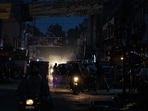 A dark street in a commercial area in Lahore, Pakistan.