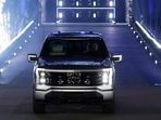 (FILES) Ford Motor Company' unveils their new electric F-150 Lightning outside of their headquarters in Dearborn, Michigan on May 19, 2021. (AFP)