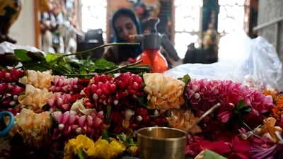 Flower garlands are being prepared for decoration in the ISKCON temple of Noida on the foundation day of Ram temple in Noida. (HT Photo/Sunil Ghosh) Flower garlands are being prepared for decoration in the ISKCON temple of Noida on the foundation day of Ram temple in Noida. (HT Photo/Sunil Ghosh)