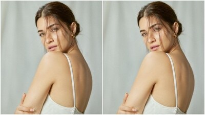 With the help of hairstylist Aasif Ahmed, Kriti styled her lush locks into a centre-parted bun, leaving a section of her hair open at the front to beautifully frame her face.&nbsp;&nbsp; (Instagram/@kritisanon)