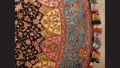 A rare round kaleen with an intricate pattern in hand- knotted silk. (Image courtesy Promil Pande / National Cottage Emporium, New Delhi) A rare round kaleen with an intricate pattern in hand- knotted silk. (Image courtesy Promil Pande / National Cottage Emporium, New Delhi)