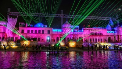 &nbsp;A glimpse of the laser show at Ram ki Pedi ahead of the 'Pran Pratishtha' ceremony in Ayodhya on Friday. (ANI)